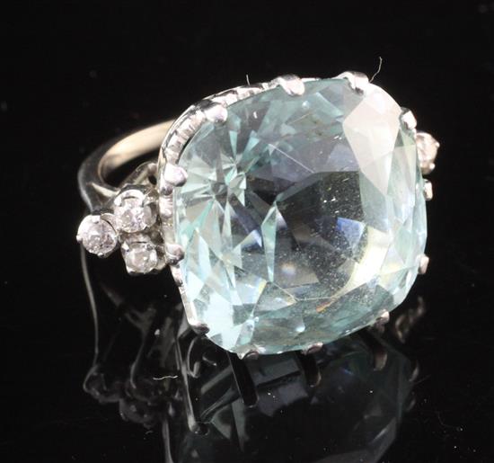 An 18ct white gold, aquamarine and diamond ring, size K.